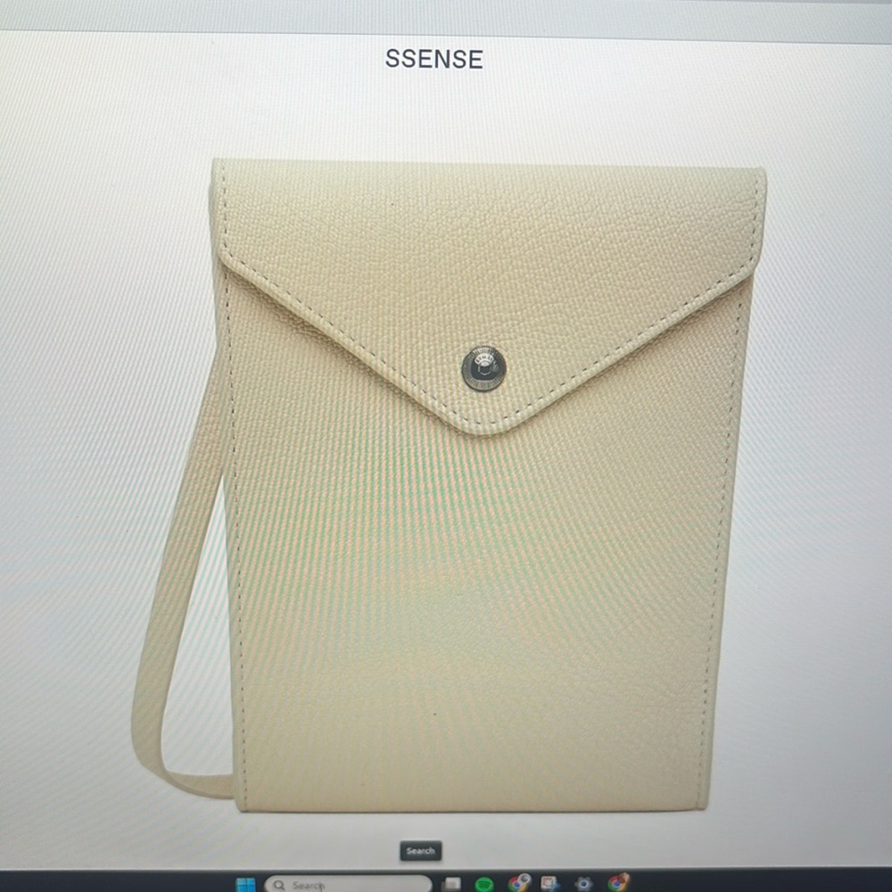 BNWT- Lemaire pocket cross body bag. Bone ivory. (Light cream)